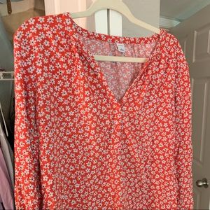 Floral red long sleeve top.